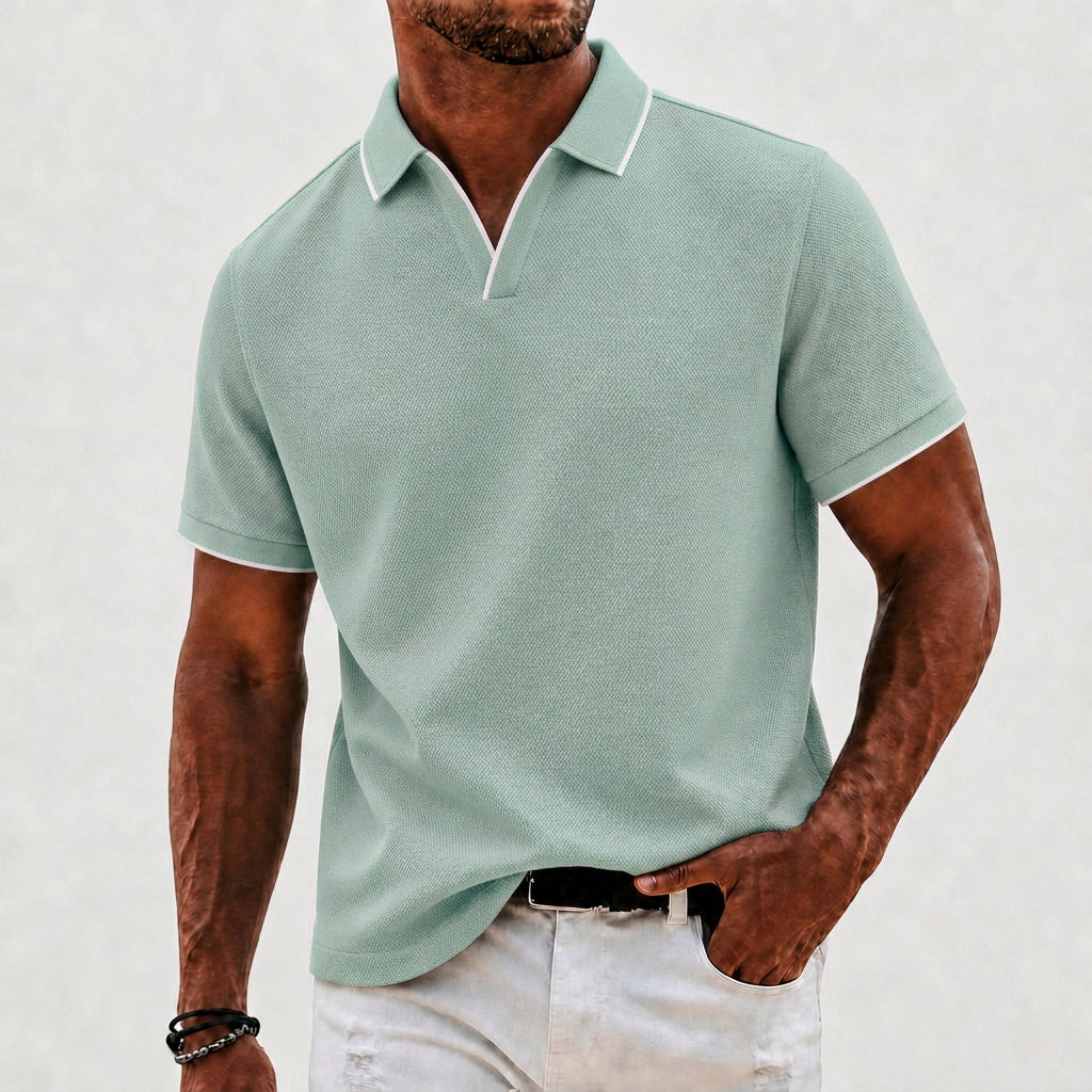Elegant men's knit polo shirt with classic collar. Perfect for versatile smart-casual and everyday style.