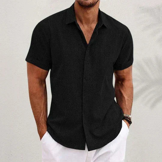 Men's short-sleeve button-up summer shirt with a classic collar. Relaxed fit, versatile for casual men's fashion.