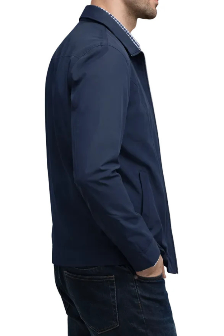 Structured men's collared Harrington jacket. Casual zip outerwear with eye-catching check lining for men.