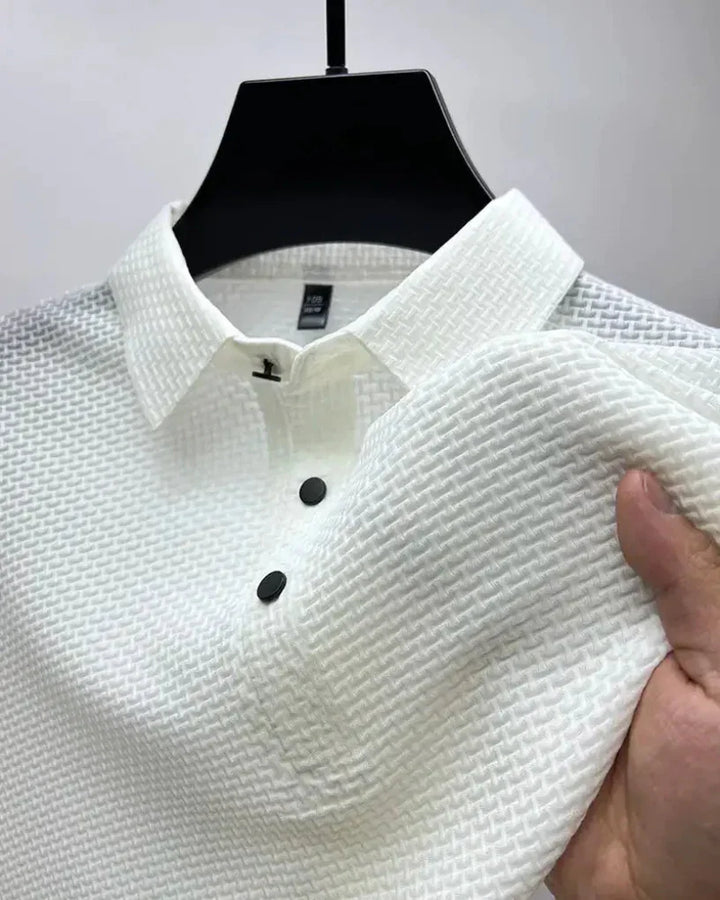 Versatile men's polo shirt, an elegant comfort top for fashion-forward looks. Classic short-sleeve design.