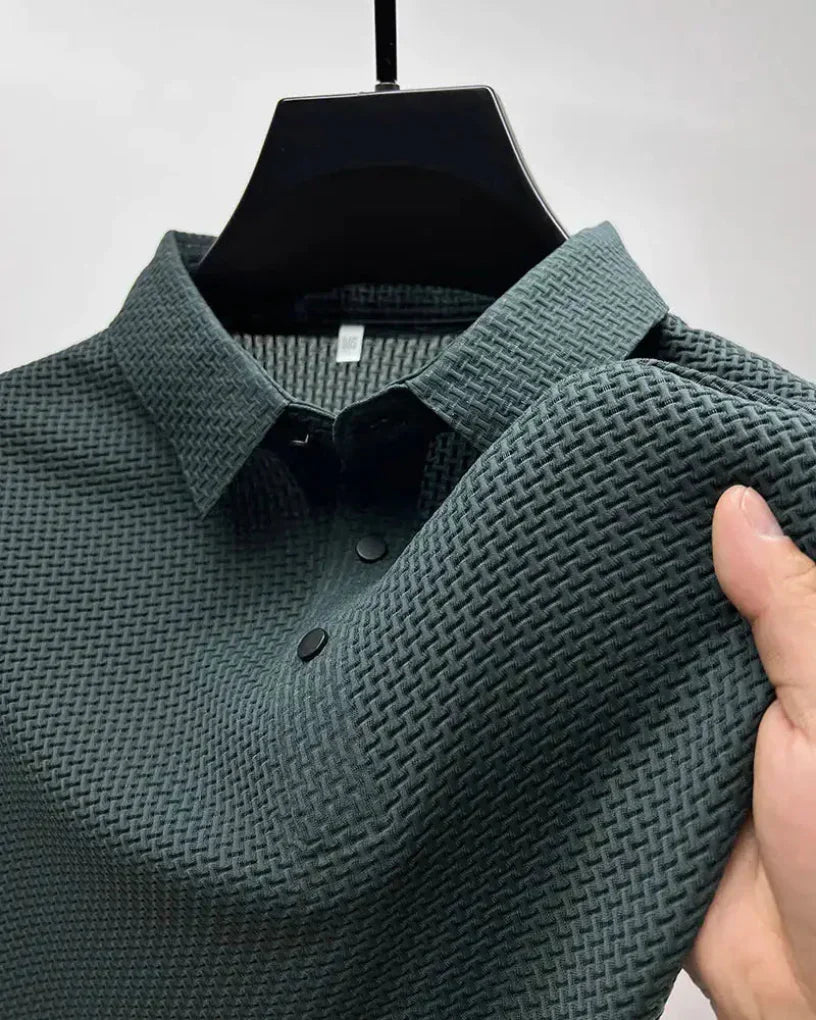 Close-up of men's classic comfort polo, showing collar detail & soft fabric. Essential versatile men's shirt.
