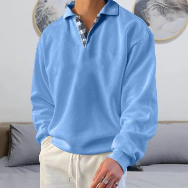 Enjoy comfort and style with this versatile men's classic long sleeve pullover sweater.