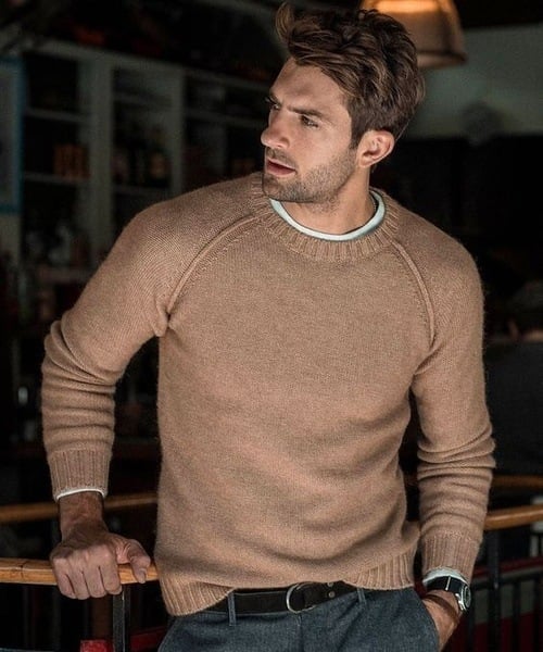 Classic men's crew neck knit sweater, long sleeve pullover with raglan detail for casual wear.