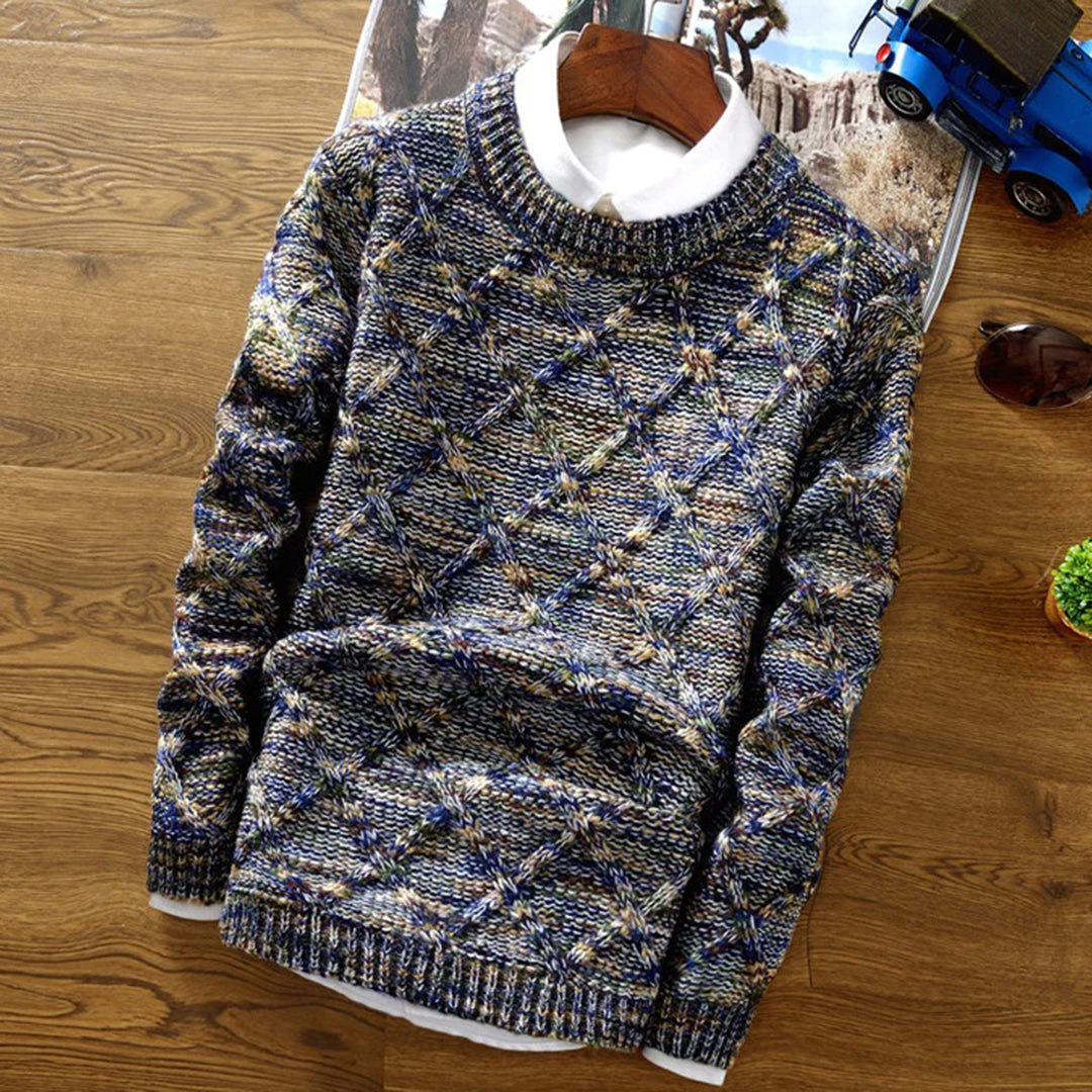 Close-up of a cozy men's long sleeve knit sweater featuring a traditional crew neck and diamond design.