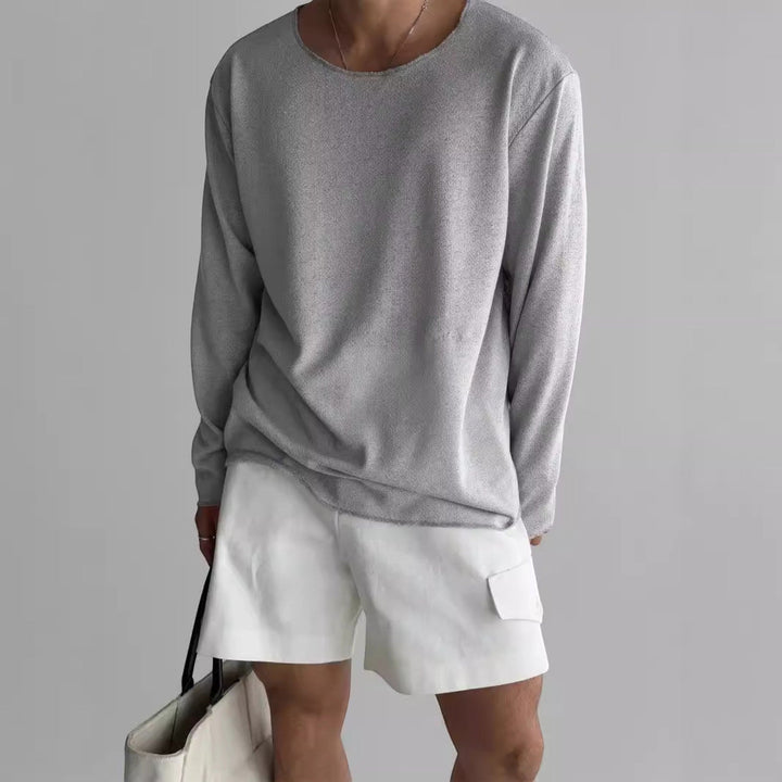 Versatile men's long sleeve crew neck t-shirt, ideal for layering or casual everyday style.