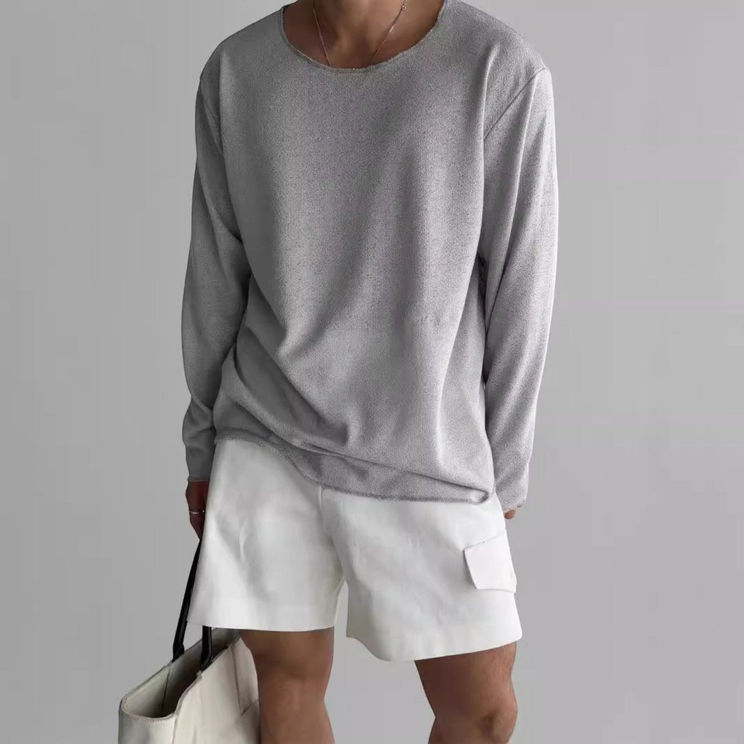 Comfortable men's regular fit long sleeve t-shirt with a classic crew neck, a wardrobe essential.