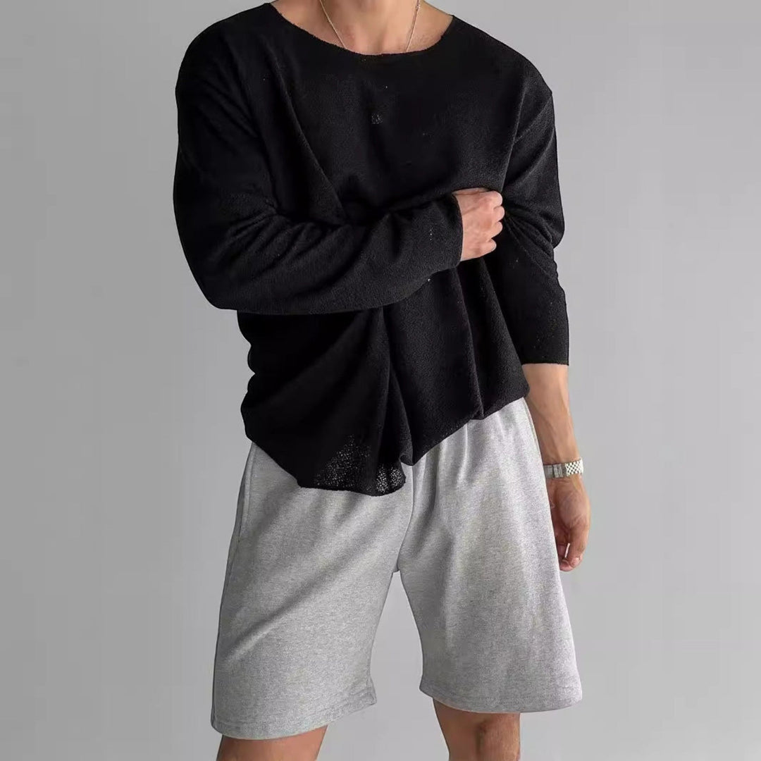 Front view of a men's regular fit long sleeve crew neck t-shirt, great for casual layering.