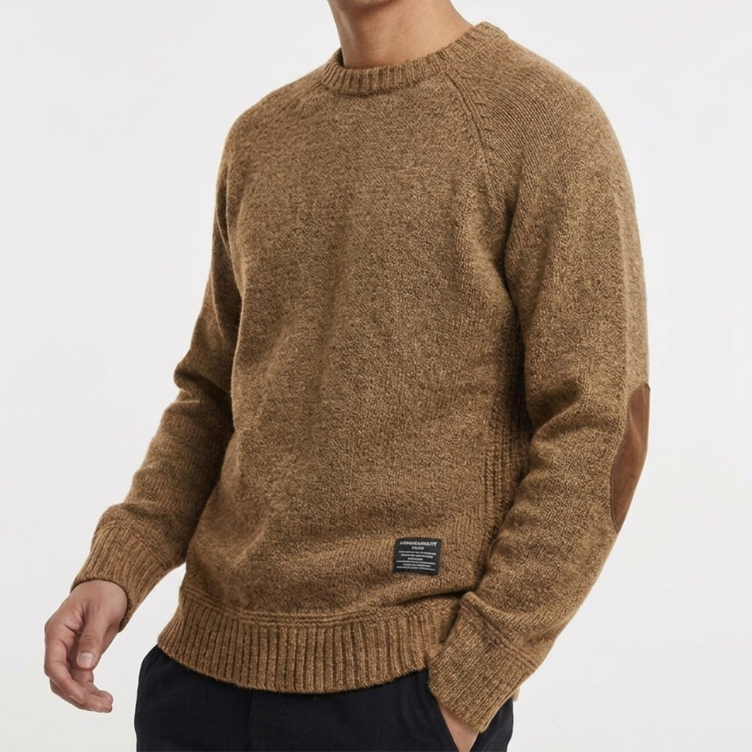 A close-up view of the texture on a men's wool blend crew neck sweater