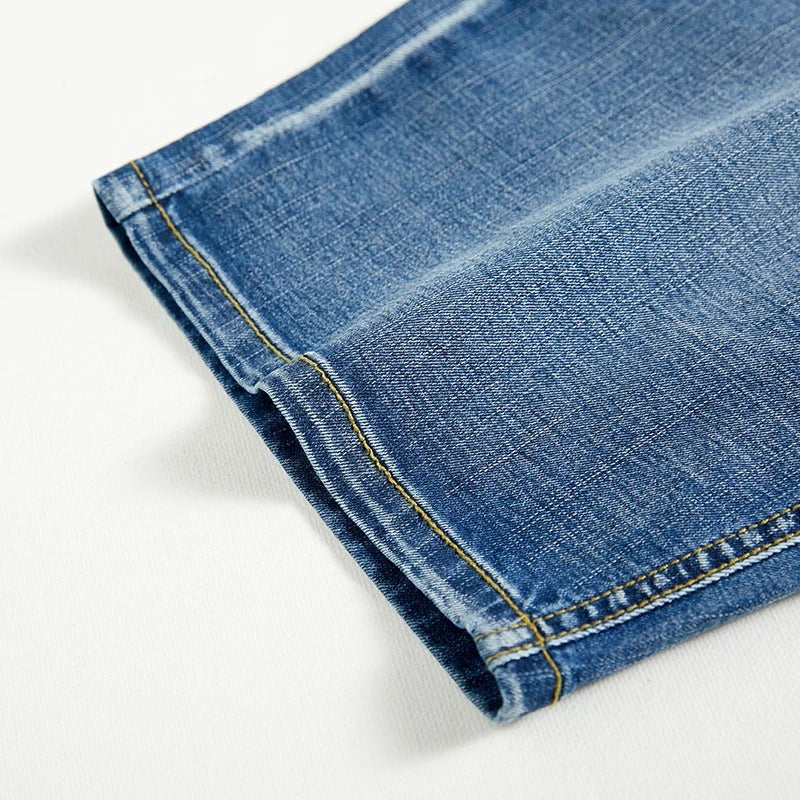 Relaxed fit men's classic denim shorts with a button fly and pockets. Essential for summer comfort & style.
