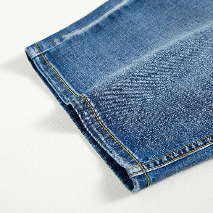 Relaxed fit men's classic denim shorts with a button fly and pockets. Essential for summer comfort & style.