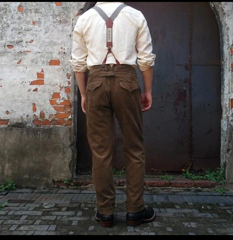 Formal wear men's pleated pants in a classic fit, complete with adjustable suspenders.