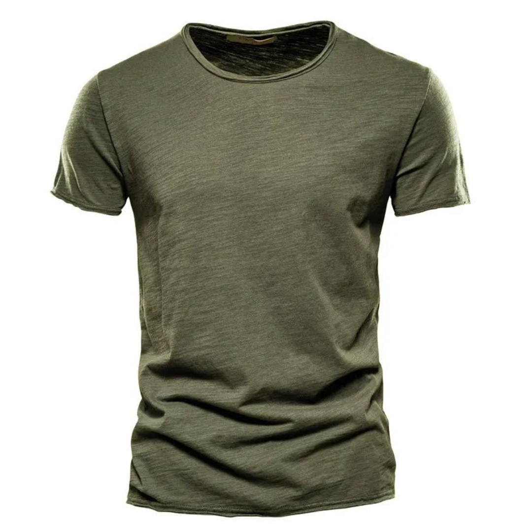 Man wearing a versatile black classic t-shirt, styled for smart casual occasions.