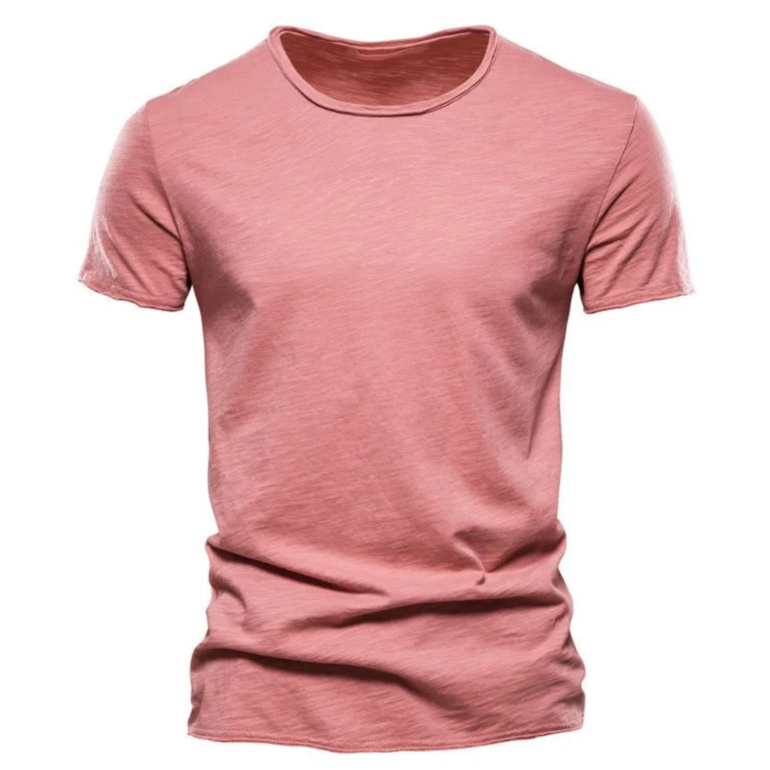 Stack of men's classic t-shirts in various colors, highlighting basic tee essentials.