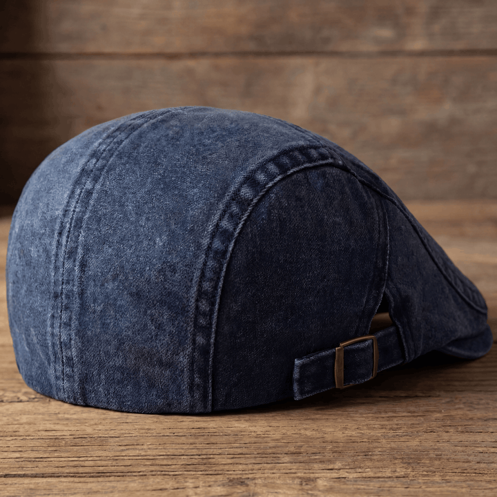 Front view of a versatile men's driving cap, a staple in classic menswear headwear.
