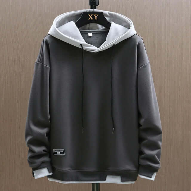 Stylish men's navy pullover hoodie, ideal for loungewear or casual outfits, with a cozy adjustable hood & pockets.