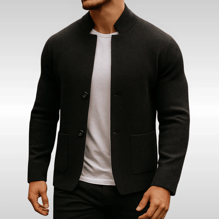 Stylish men's black textured pocket cardigan, perfect versatile layering for modern menswear & casual comfort.