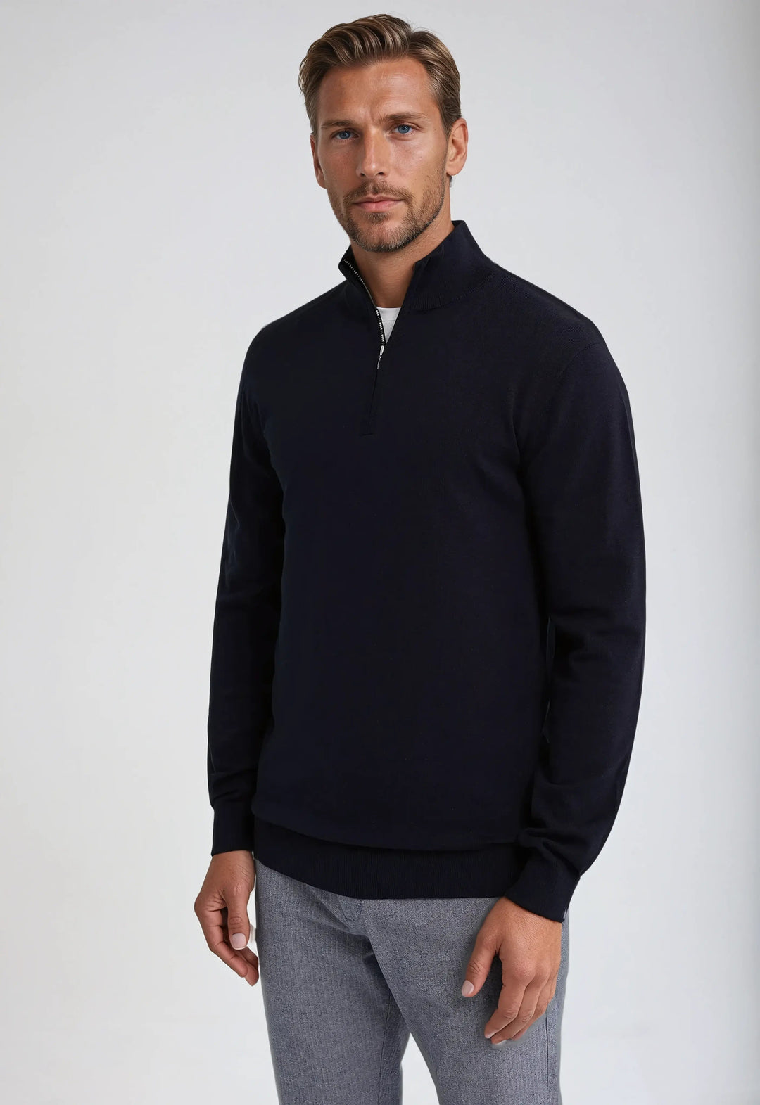 Front view of men's classic half-zip sweatshirt. Pullover design with long sleeves, tailored for effortless style.