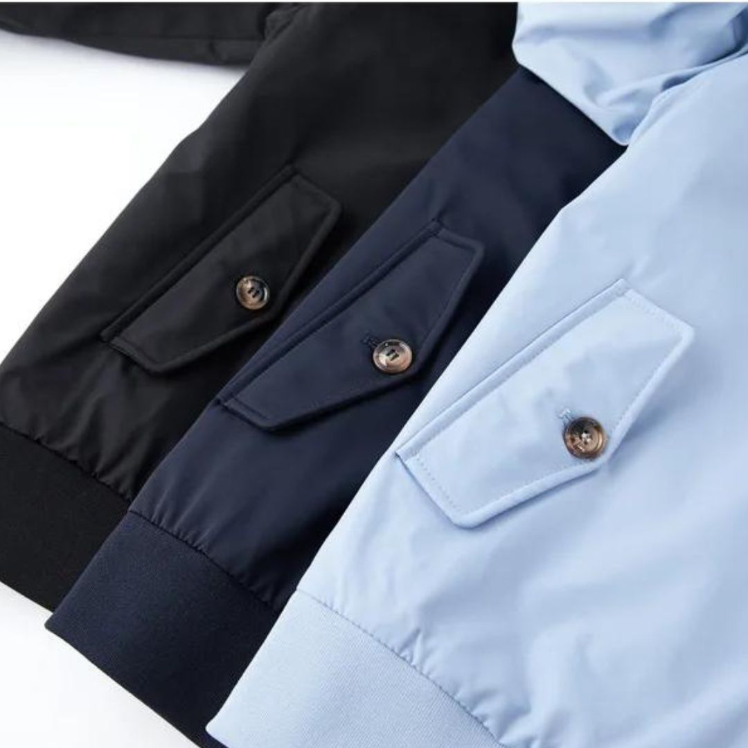 Front view of a men's classic Harrington jacket, showcasing the sophisticated design & peek of tartan lining.