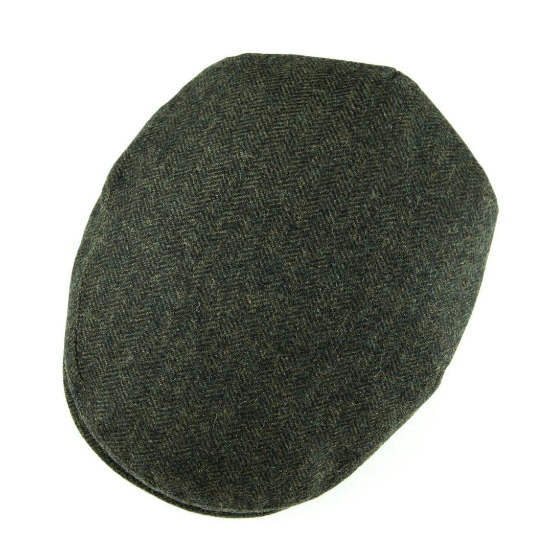 Versatile men's classic flat cap in herringbone, suitable for various casual outfits.