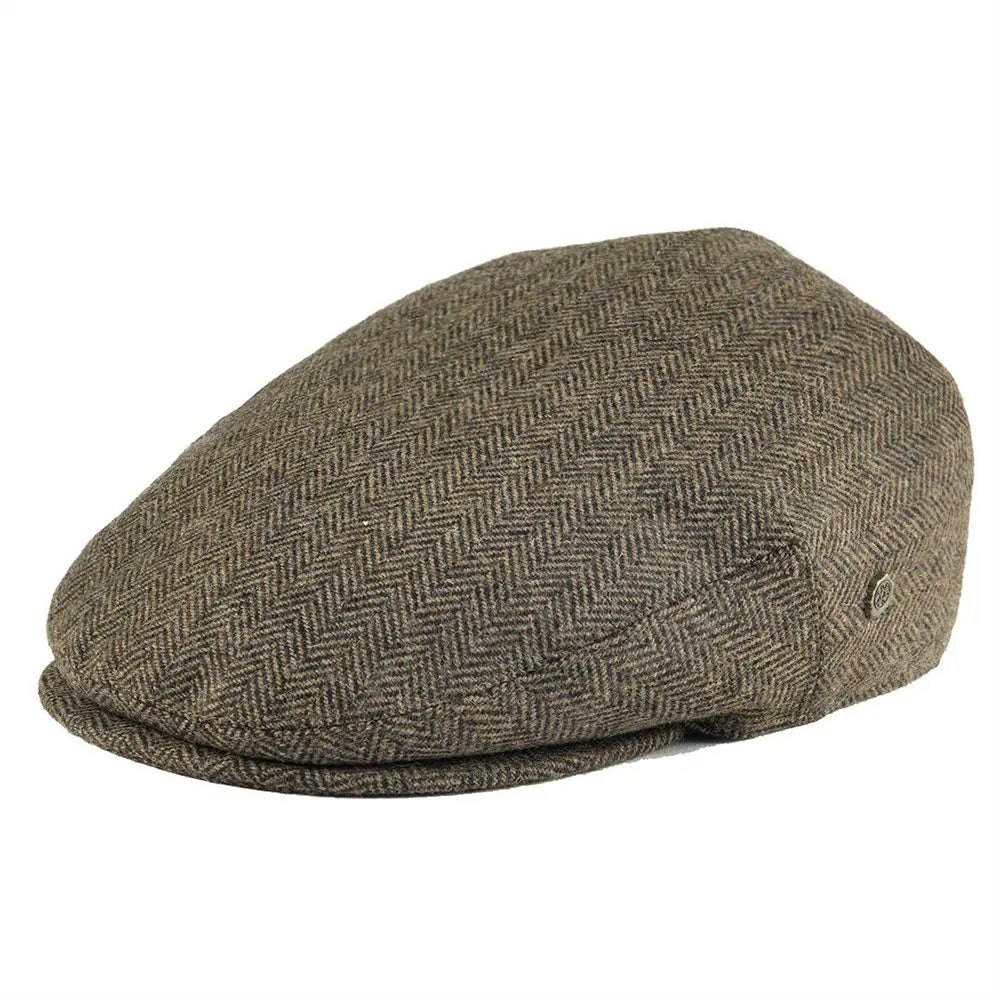 Close-up of the textured herringbone pattern on a men's classic flat cap.