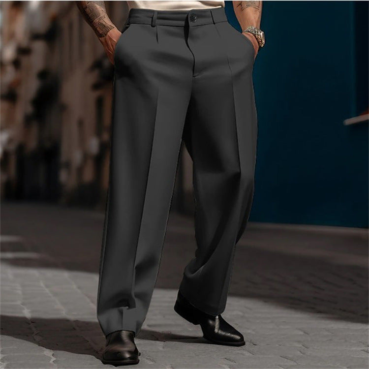 Men's high-waisted wide leg suit trousers paired with a classic shirt, creating a modern office or elegant casual chic look.