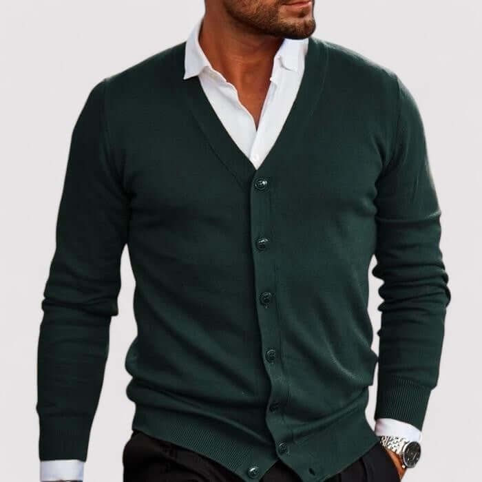 Stylish men's button-front knitted cardigan in navy blue, ideal for versatile casual or smart-casual outfits.