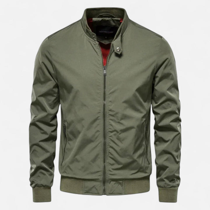 Modern men's bomber jacket featuring a ribbed collar & cuffs. Ideal for layering, offering a comfortable, casual look.