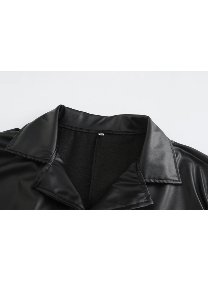 Men's long leather coat with a sleek, sophisticated silhouette for winter fashion.