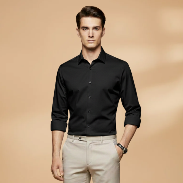 Detail of men's patterned long sleeve button-down shirt, showing fabric texture and buttons.