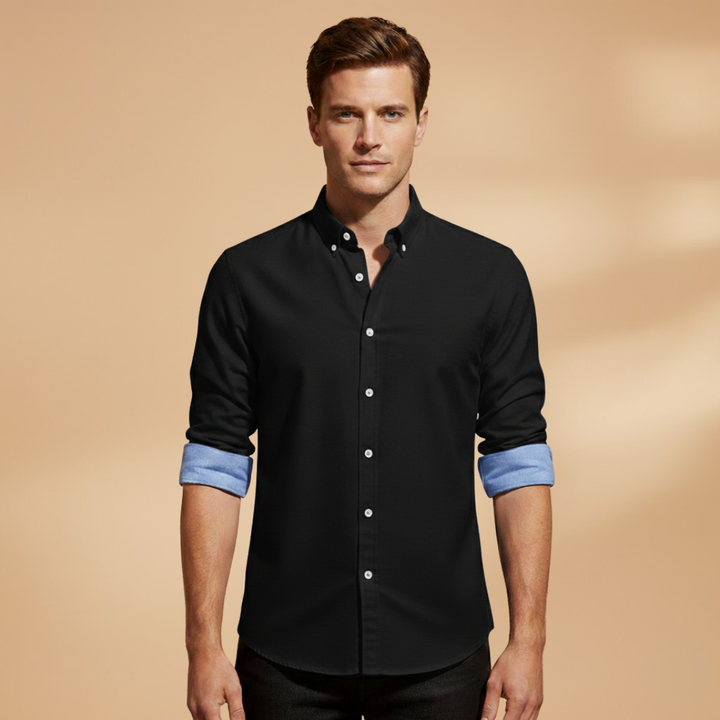Back view of men's classic long sleeve button-up shirt, showcasing its structured fit, long sleeves, and timeless design.
