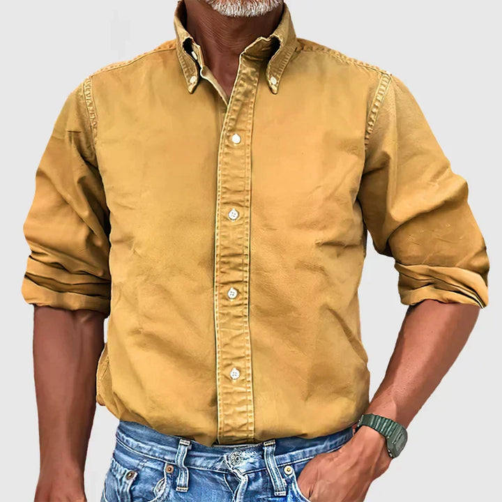 Professional man in a classic long-sleeve button-up shirt, ideal for office or formal men's style.
