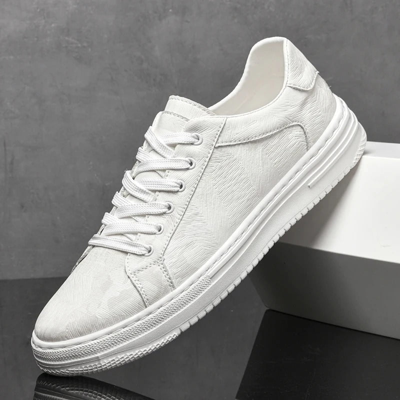 Men's classic low-top lace-up sneakers. Essential versatile trainers for modern casual outfits.