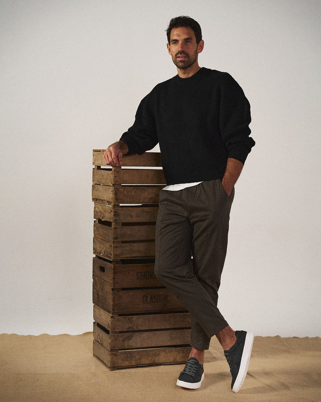 Beige men's low-top lace-up trainers. Comfortable & stylish everyday casual footwear, perfect for modern men.