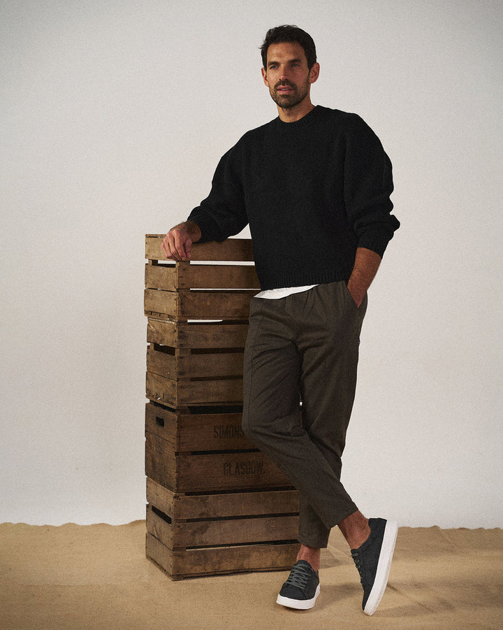 Beige men's low-top lace-up trainers. Comfortable & stylish everyday casual footwear, perfect for modern men.
