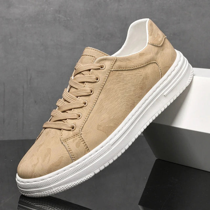 Men's low-top lace-up trainers for effortless style. Everyday casual footwear, comfortable & versatile.