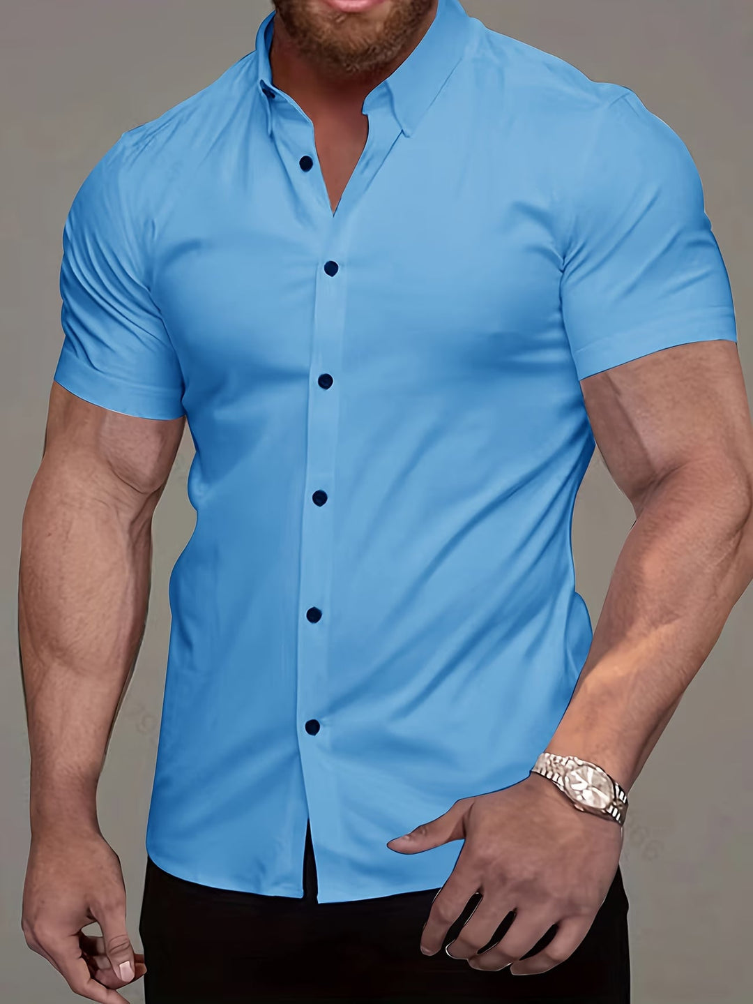 Classic men's muscle fit button-up shirt. Tailored for a modern look, great for versatile smart casual outfits.