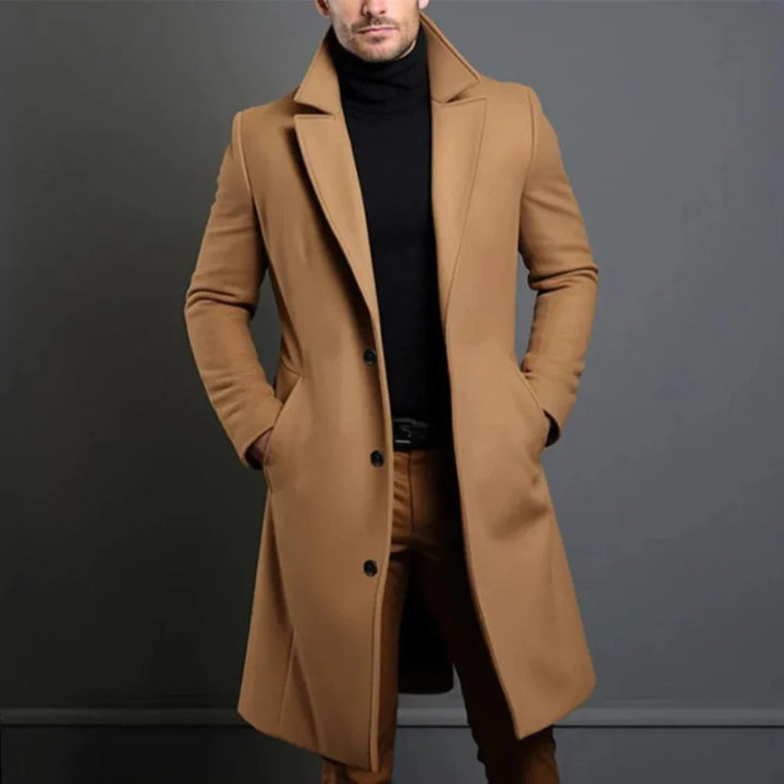 Sophisticated men's longline overcoat for cool seasons. Timeless design, ideal for business or smart casual wear.