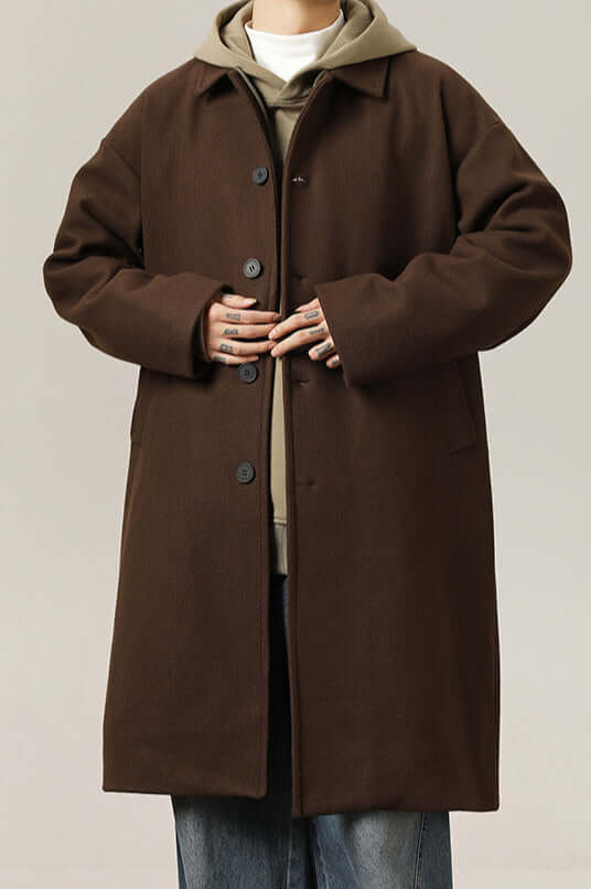 Elegant brown men's oversized winter coat, a classic jacket for timeless style & modern men's fashion outerwear.