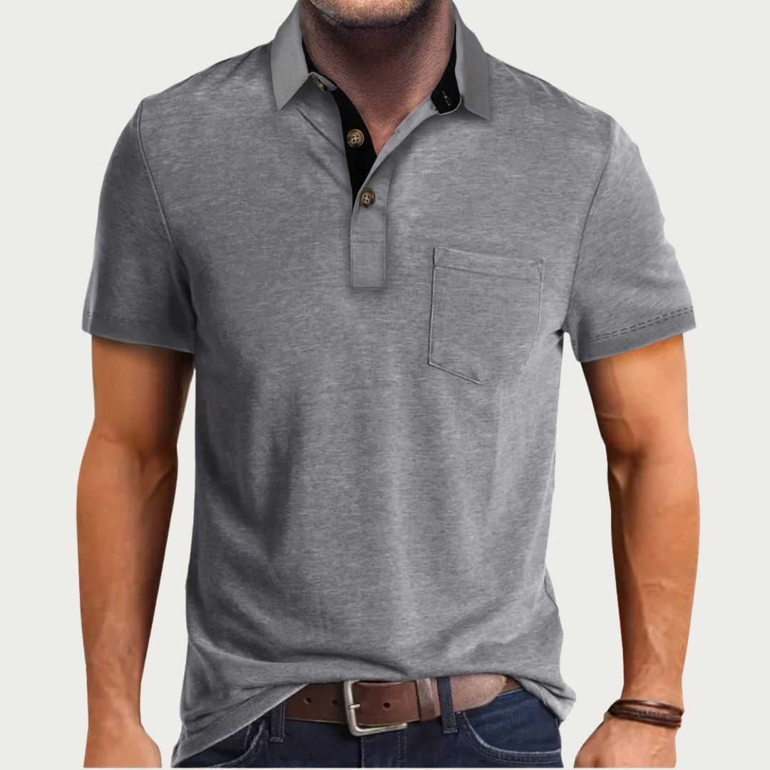 Close-up of the breathable fabric on a men's classic polo shirt, highlighting comfort and quality menswear.