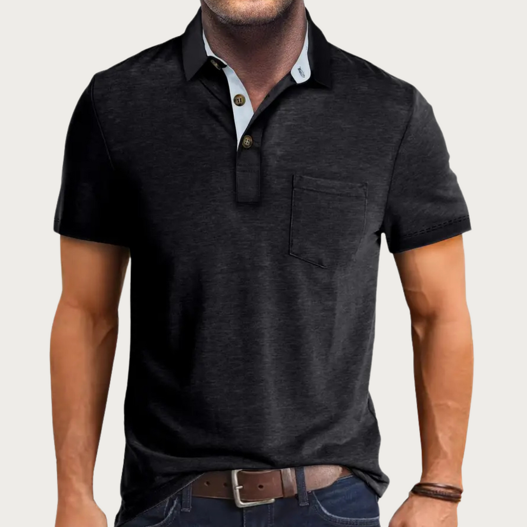 Man wearing a grey men's polo shirt, a versatile wardrobe staple for all-season casual and smart casual occasions.