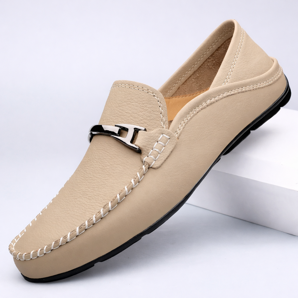 Polished men's classic loafers, comfortable slip-on shoes ideal for versatile casual or smart attire.