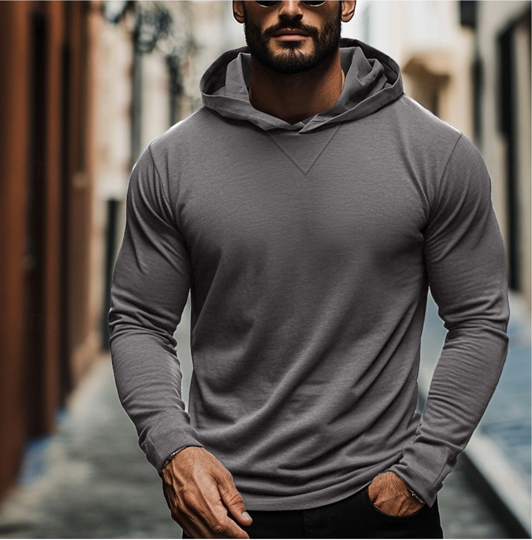 Stylish men's casual wear: a comfortable pullover hoodie, ideal for activewear and layering.