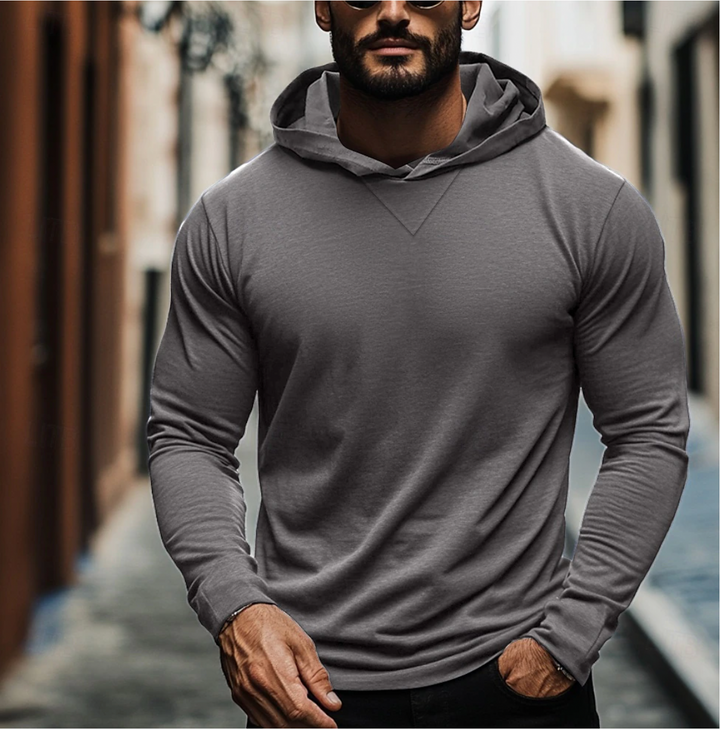 Stylish men's casual wear: a comfortable pullover hoodie, ideal for activewear and layering.