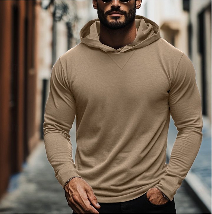 Warm and comfortable men's long sleeve hoodie, a must-have pullover for loungewear and casual outings.