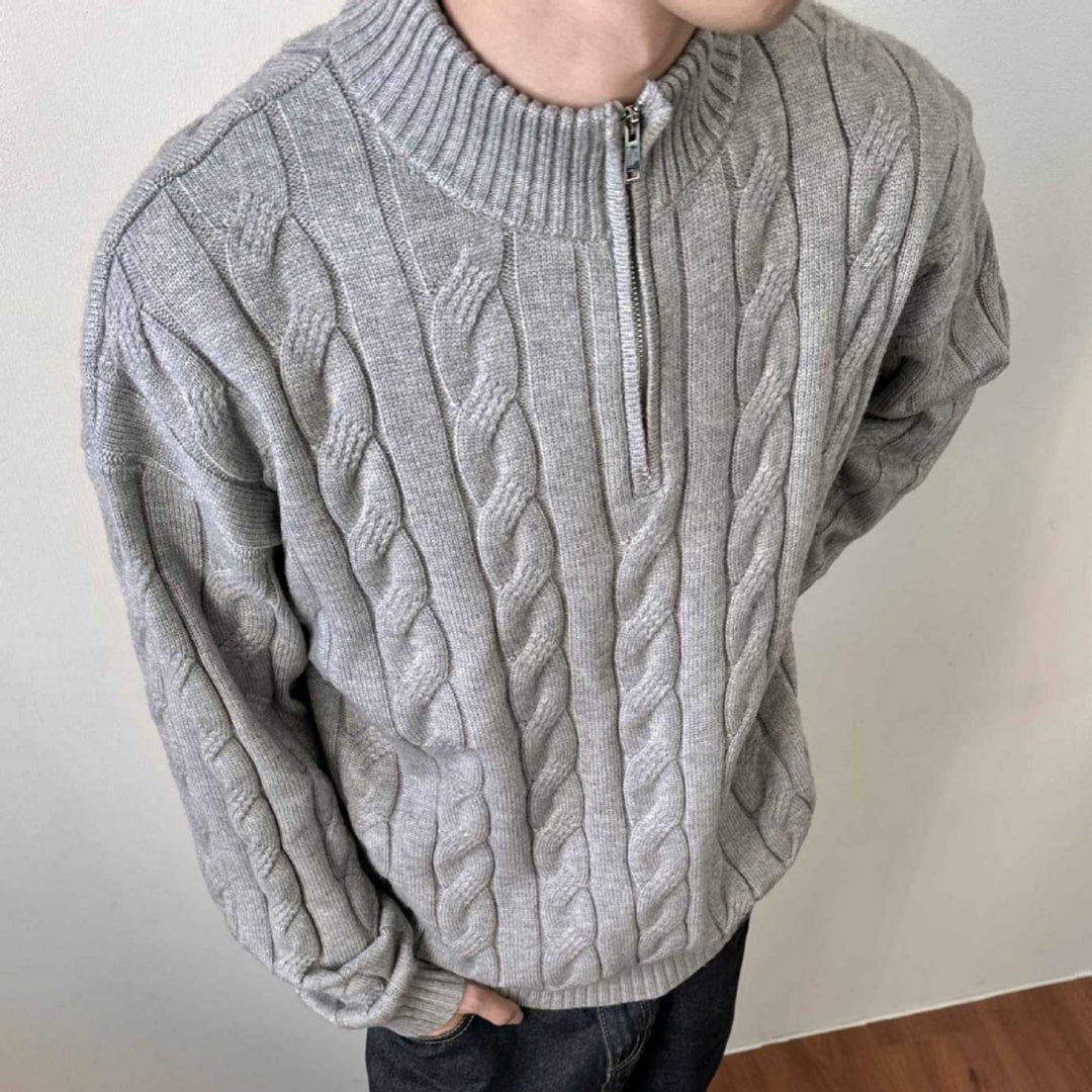 Men's classic quarter-zip cable knit sweater with mock neck and ribbed collar, perfect for fall and winter.
