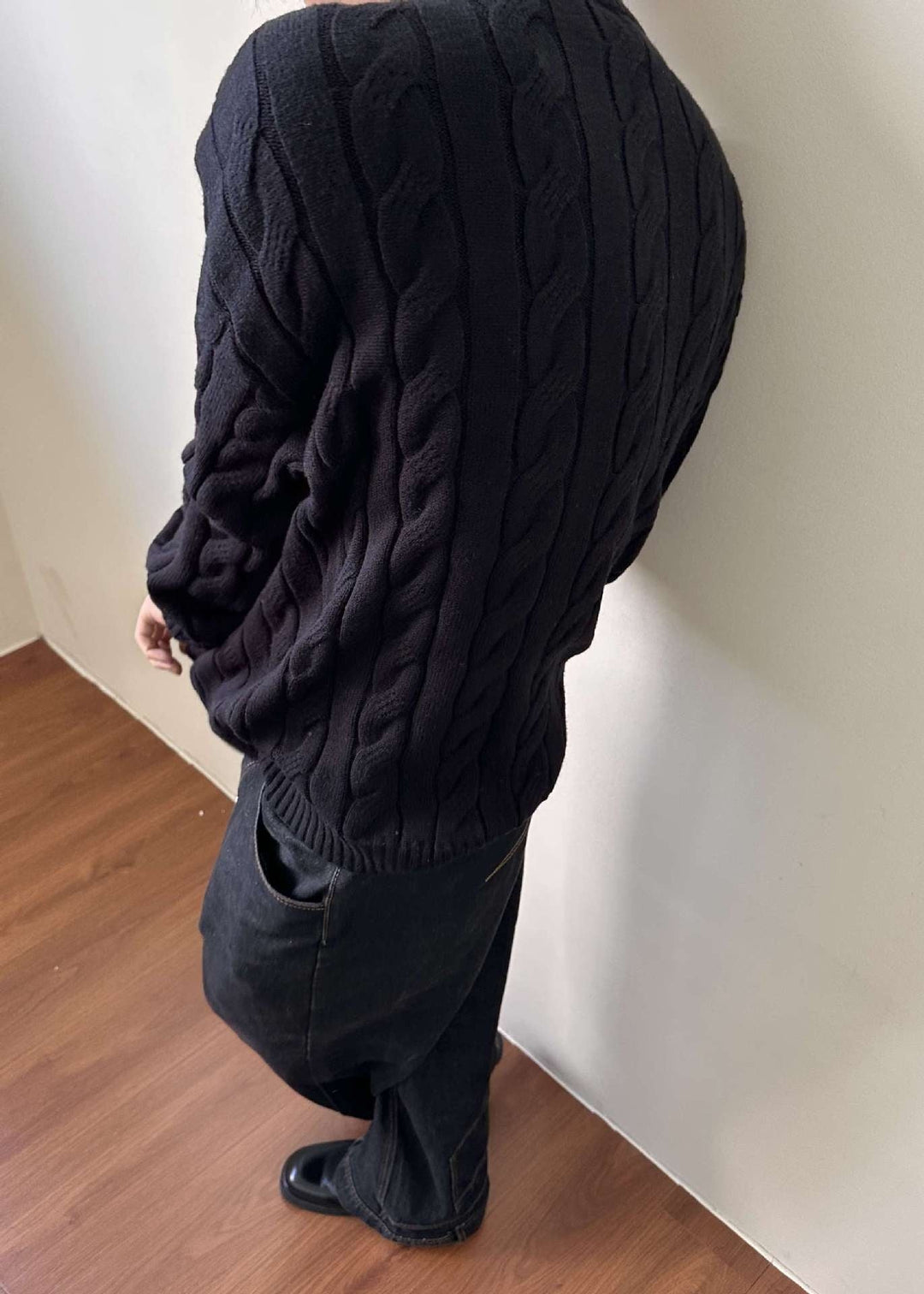Classic men's cable knit quarter-zip pullover. Comfortable fit, mock neck, and ribbed details for versatile style.