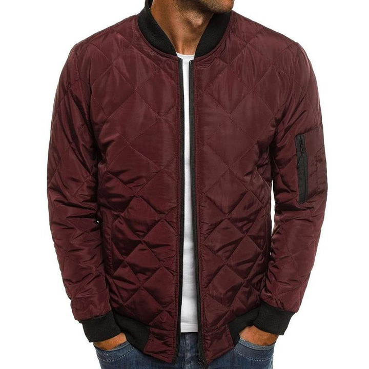 Front view of men's classic quilted bomber jacket, perfect zip-front outerwear for casual autumn style.