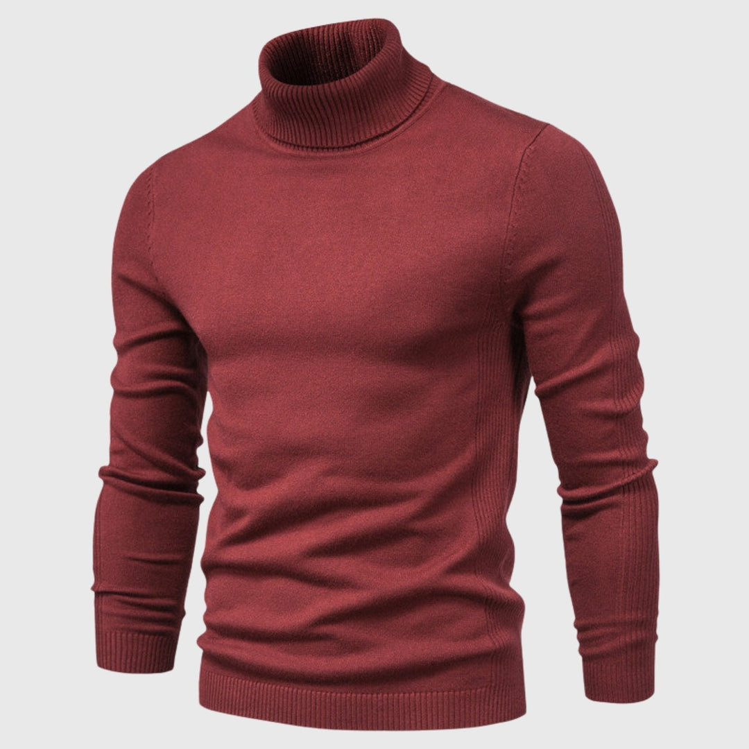 Men's roll neck jumper in an outdoor setting, offering comfortable autumn style & winter warmth.