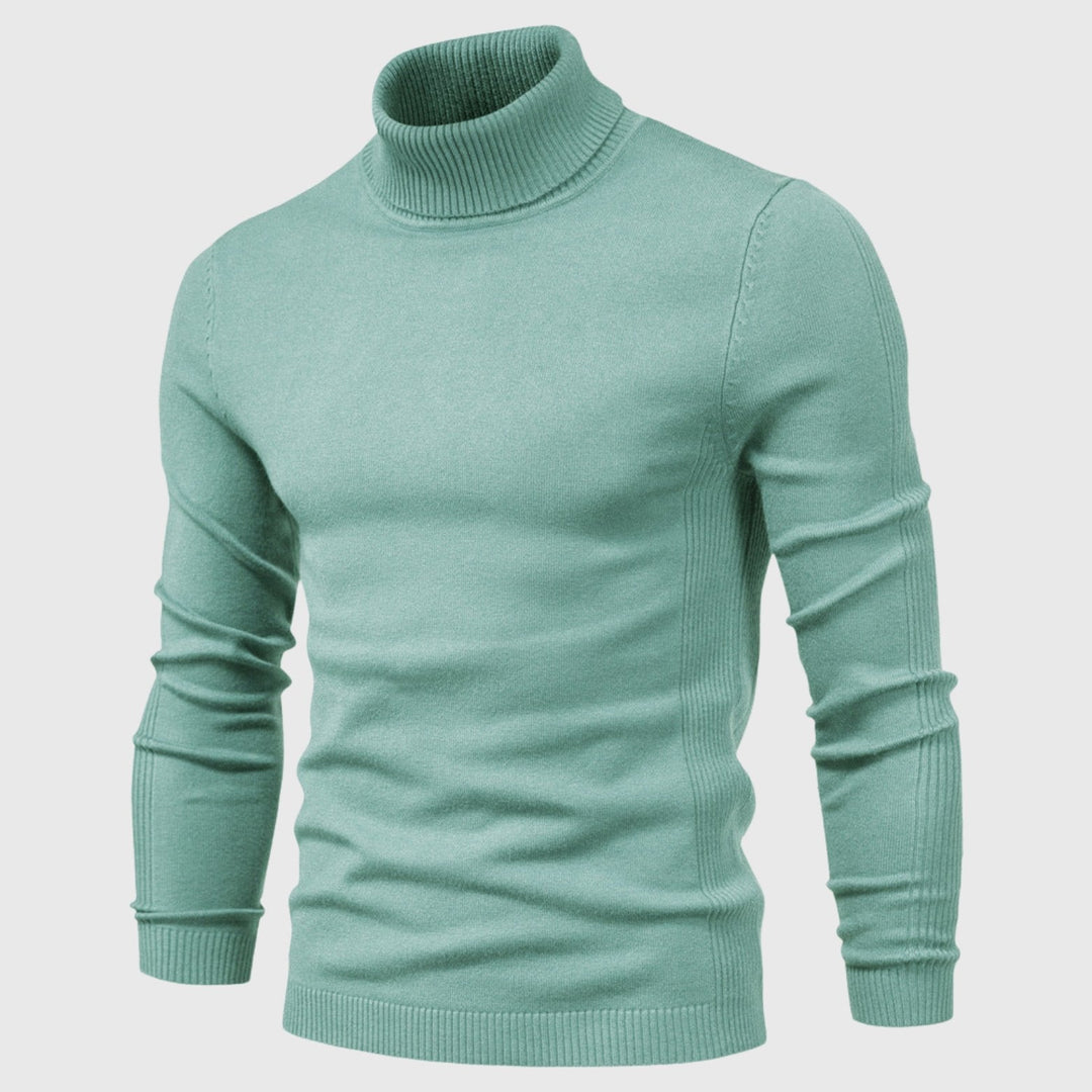 Model wearing a timeless men's roll neck jumper for a smart casual autumn outfit. Comfortable fit.