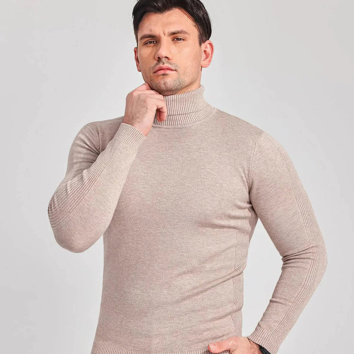 Side profile of a men's long sleeve roll neck jumper, emphasizing its comfortable fit & classic winter style.